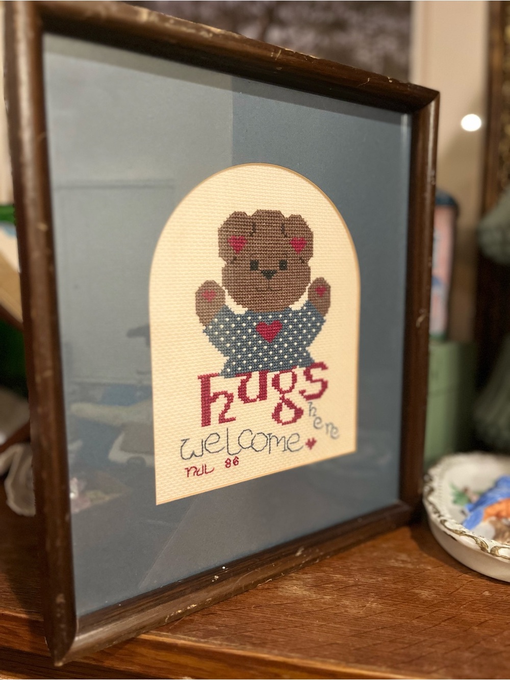 Vintage Brown Bear Cross-Stitch with Blue Mat and Red Accents
